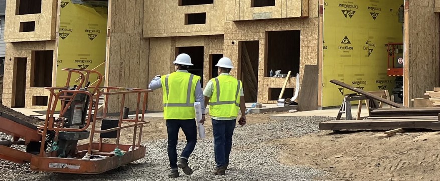 Leeway team members walking a multifamily property during a site inspection